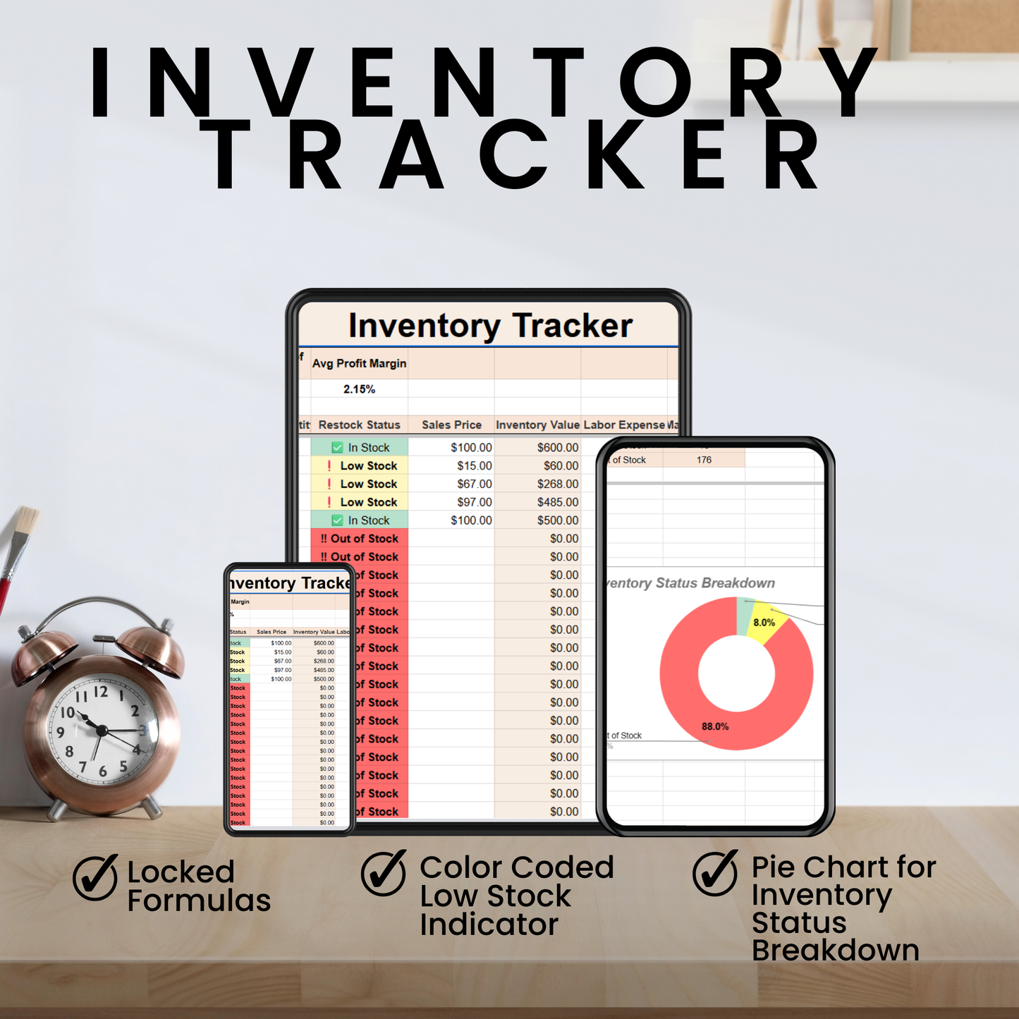 Inventory tracker software on a computer screen with a clock and pen in the background